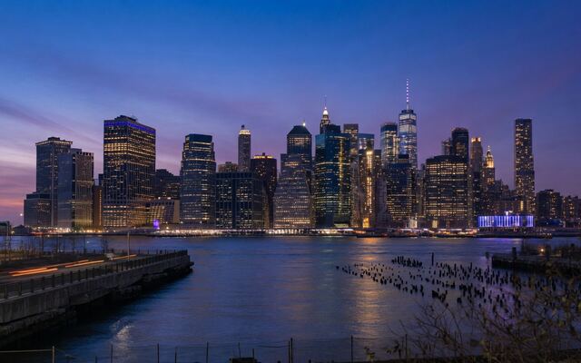 Manhattan skyline across the East River at blue hour