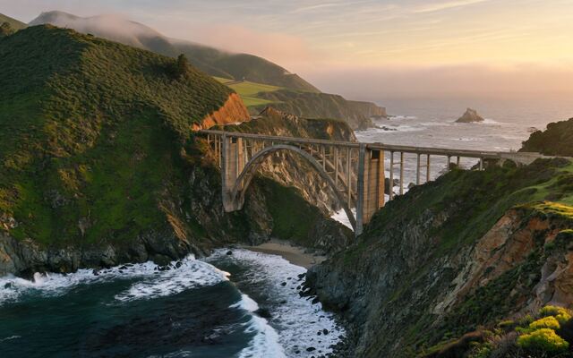 Pacific Coast arch bridge over a steep cove in Big Sur, California
