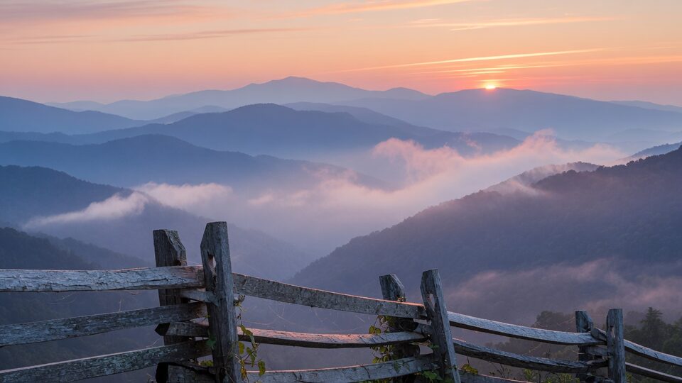 Misty blue ridges of the Great Smoky Mountains at sunrise
